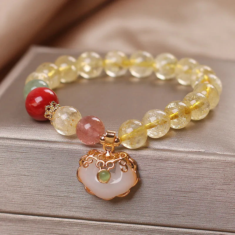 Women's natural citrine jade ruyi pendant bracelet with yellow hair crystal detail on alloy chain