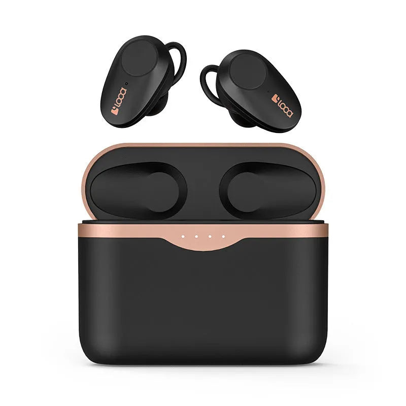 Black wireless Bluetooth headphones with charging case on a table.
