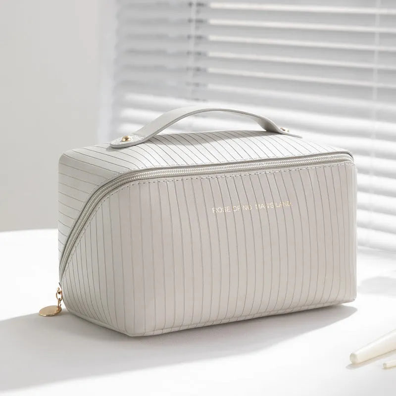 Vertical pattern PU makeup bag showing cubic 22.5cm shape in available colour options