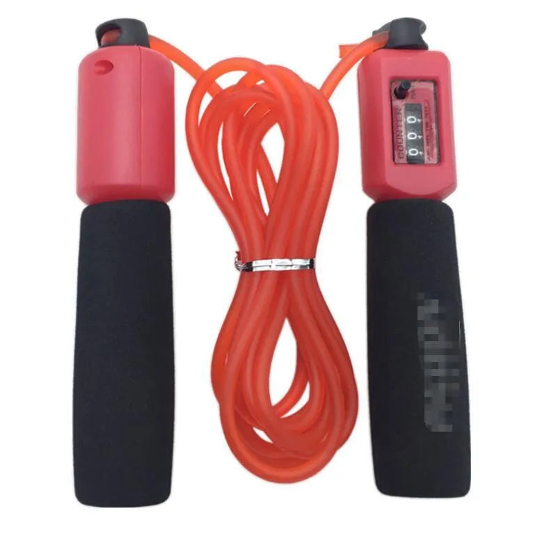 Adjustable skipping rope with blue foam handles and heavy-duty PVC cable on a grey background