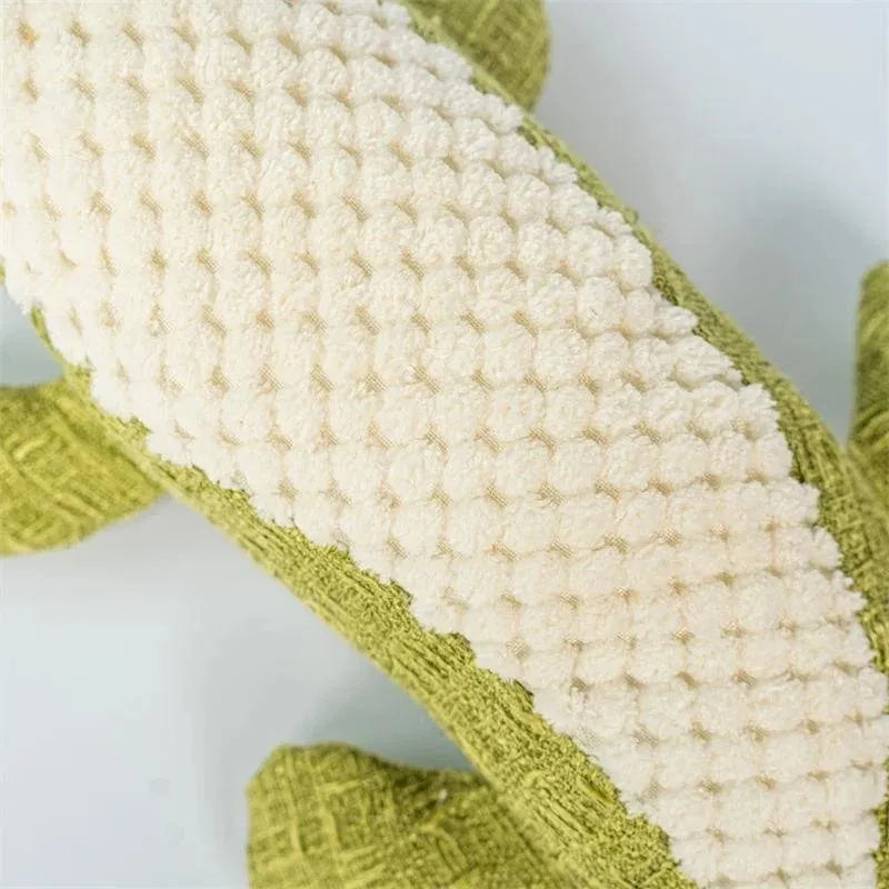 Blue, green, and red corn grid patterned plush toys for cats and dogs with a biting sound feature.
