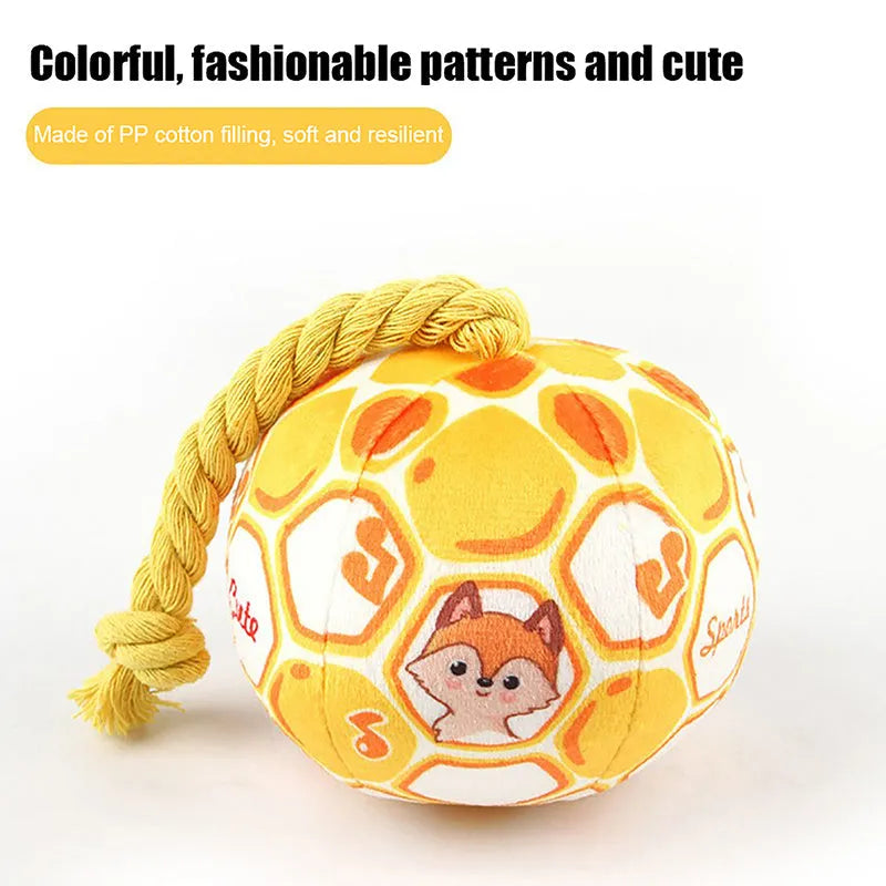 Blue and yellow elastic football dog toy with cotton rope construction for teeth grinding and interactive play