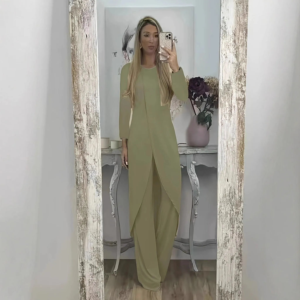 Black loose fit casual two-piece lounge set with long sleeve top and trousers on a hanger.