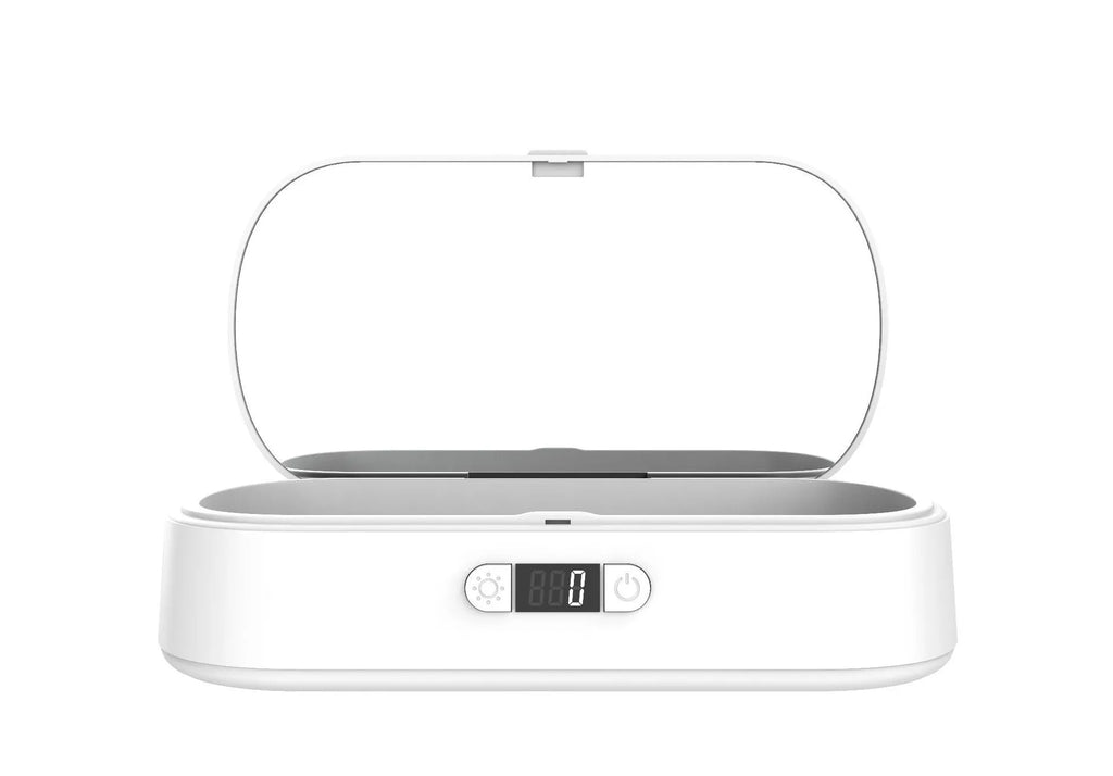 White ABS plastic UV steriliser and wireless charging box for phones and small items.
