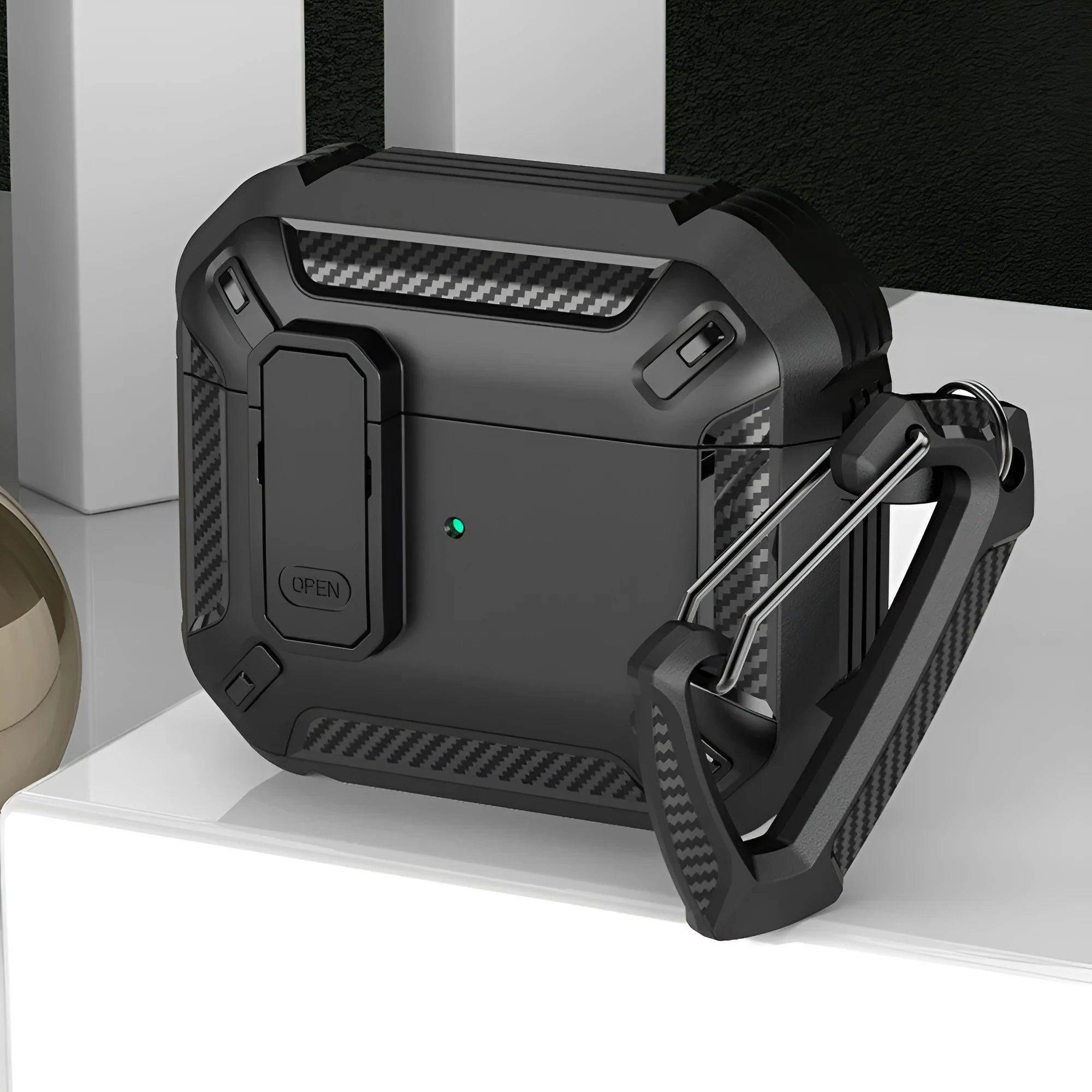 Two-tone plastic clamshell protective case for Apple AirPods with a metal carry hook attached.