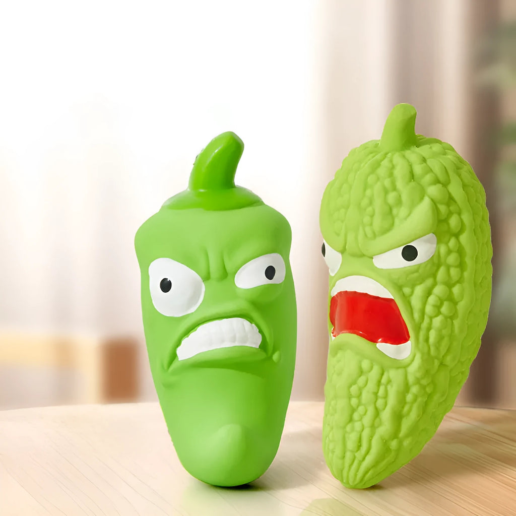 Dog chew toy shaped like bitter melon or chili with textured cleaning ridges and sound activation feature