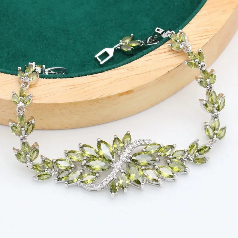 Retro jewellery set with plant pattern design showing necklace, bracelet, earrings, and ring in alloy and copper zircon