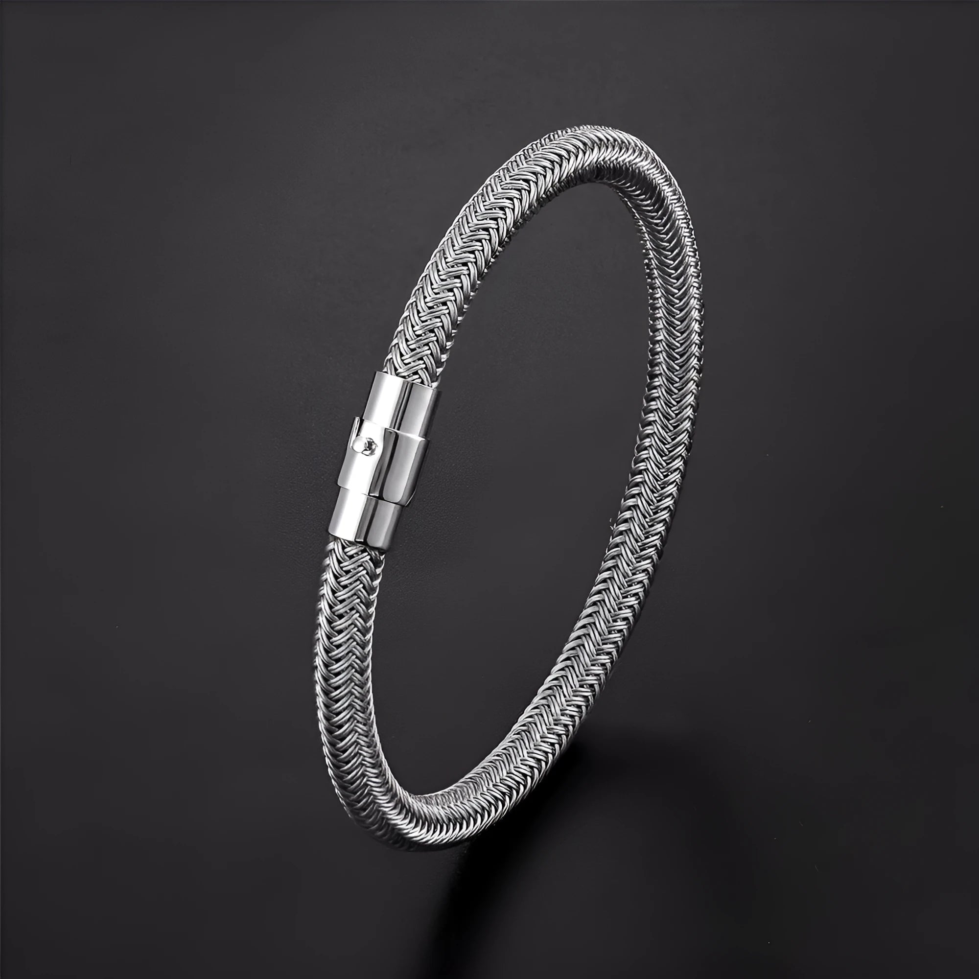 Men's geometric titanium steel bracelet with a magnetic clasp shown in silver tone.