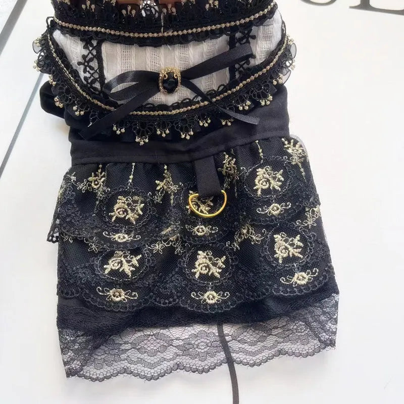 Golden gothic princess-style dress for a small dog or cat on a mannequin.