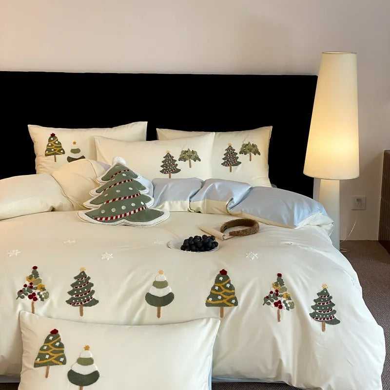 Pure cotton bedding set with embroidered Christmas trees on duvet cover, sheet, and pillowcases in cream blue or green.