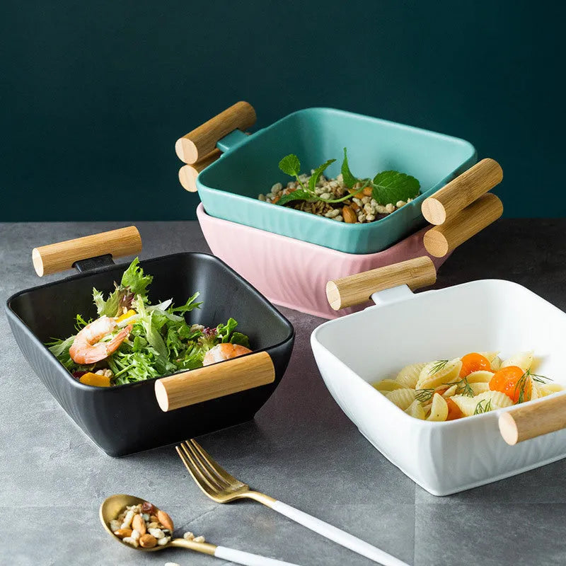 Ceramic bowl with irregular shape and matching lid in heat-resistant porcelain