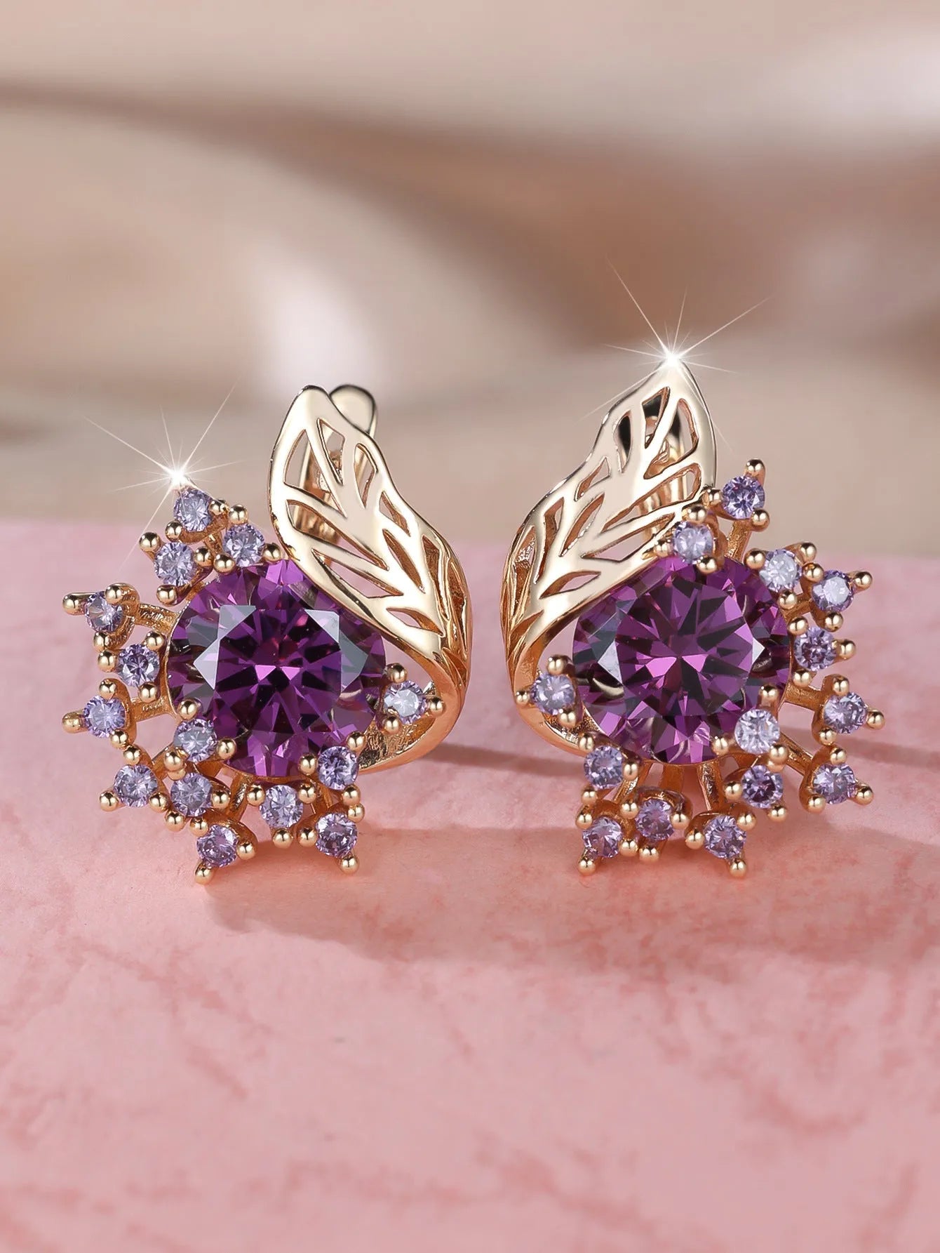 Round flower feather earrings with zircon crystals in electroplated champagne gold colour