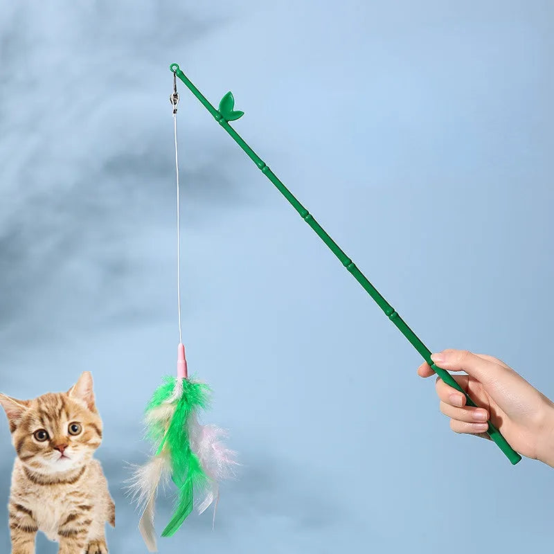 Green cat feather wand toy with bells and feathers on a durable wand with comfortable grip handle