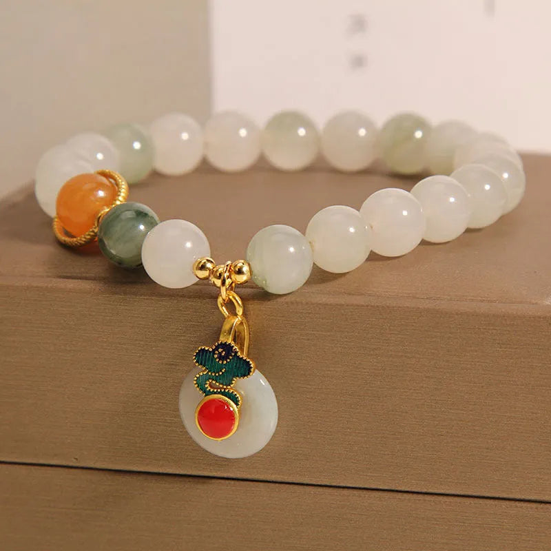 Ice jade women's bracelet with xiangyun peace jade buckle and pearl detailing