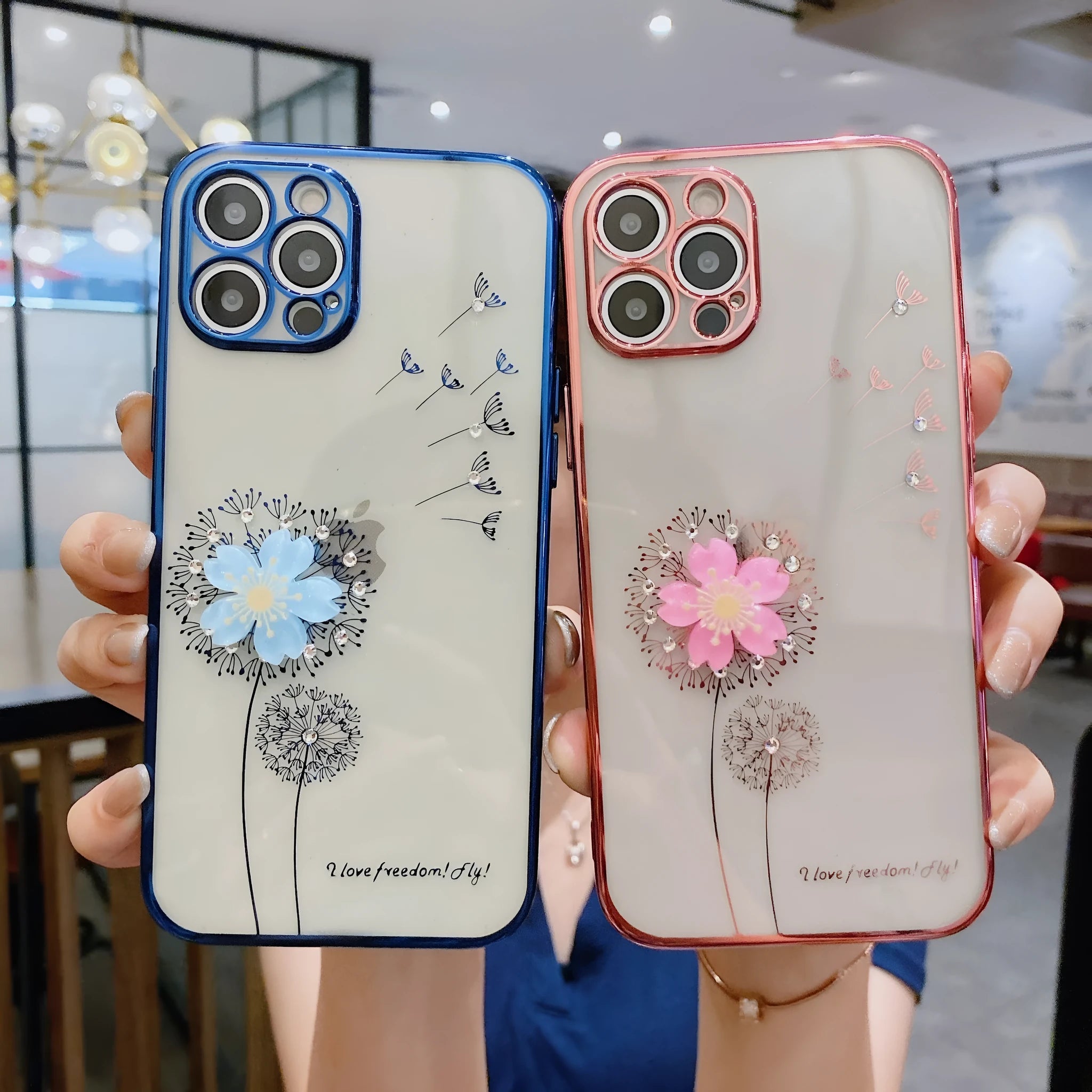 Green TPU iPhone case with a spinning 3D pink flower stand on the back