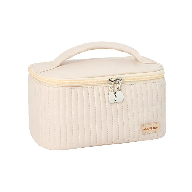 Open-top women's makeup bag in PU leather, shown in a choice of solid colours including pink, beige, and light blue.