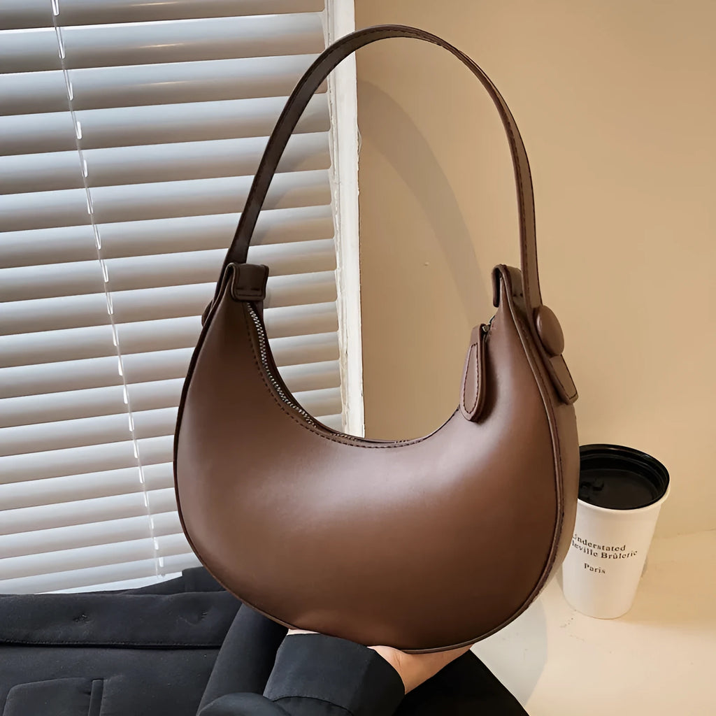 Retro dumpling-shaped women's shoulder bag in PU leather with zippered compartment