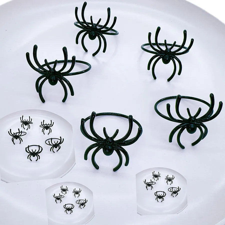 Six black spider design alloy napkin rings for Halloween table decoration