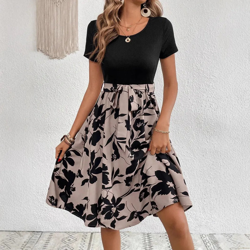 Women's khaki A-line dress with plant print, lace-up detail, and shoulder strap
