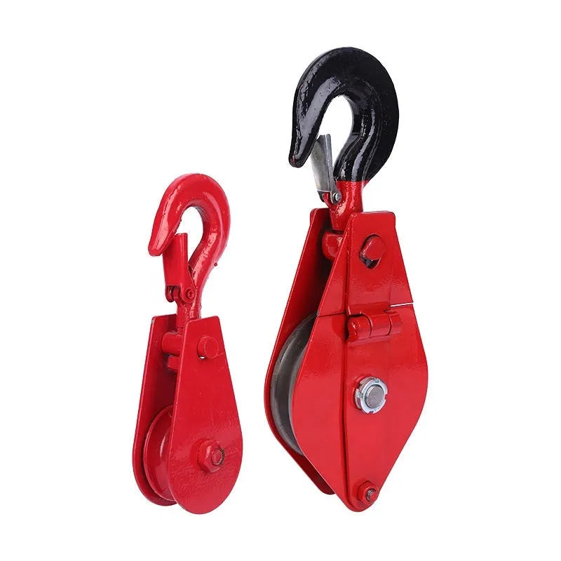 Red industrial lifting pulley with safety latch and forged steel construction