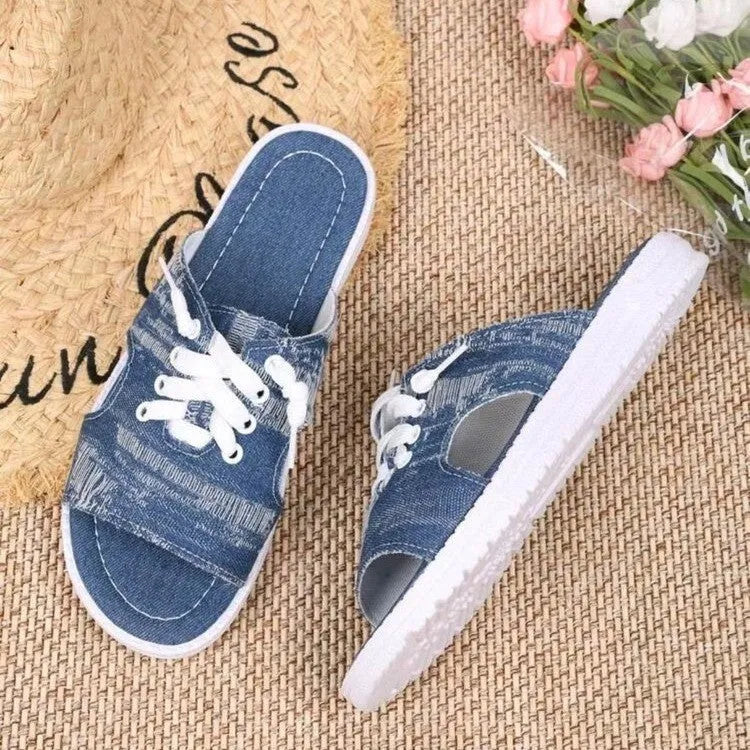 Blue Roman-style women's canvas slippers with cloth upper and rubber sole
