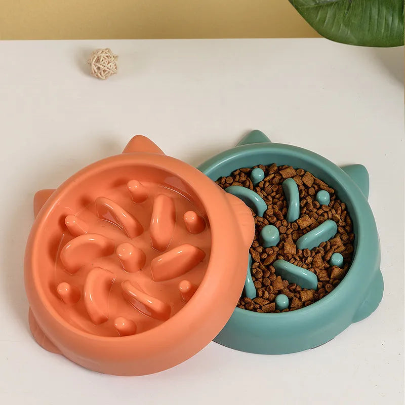 Green bone-shaped slow feeder bowl for dogs and cats with interior ridges