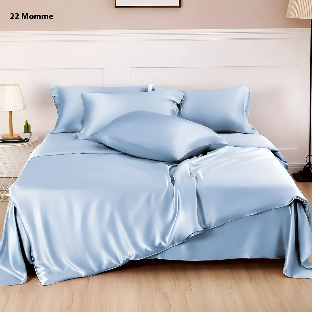 Double-sided solid colour silk duvet cover in bright brown laid flat on a bed.