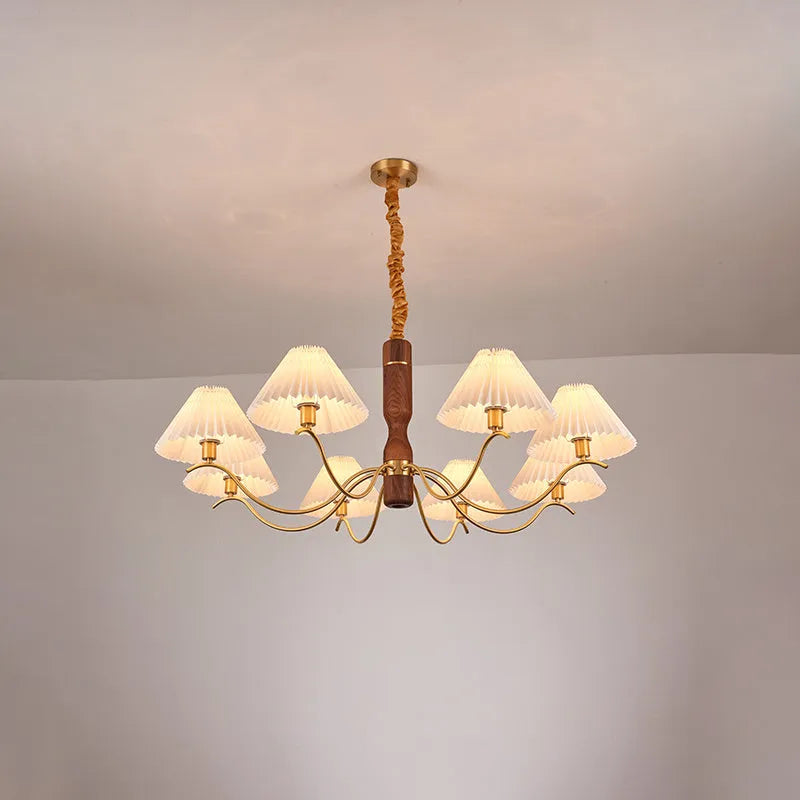 American retro style wall lamp with a walnut wood base and white fabric shade mounted on a wall.