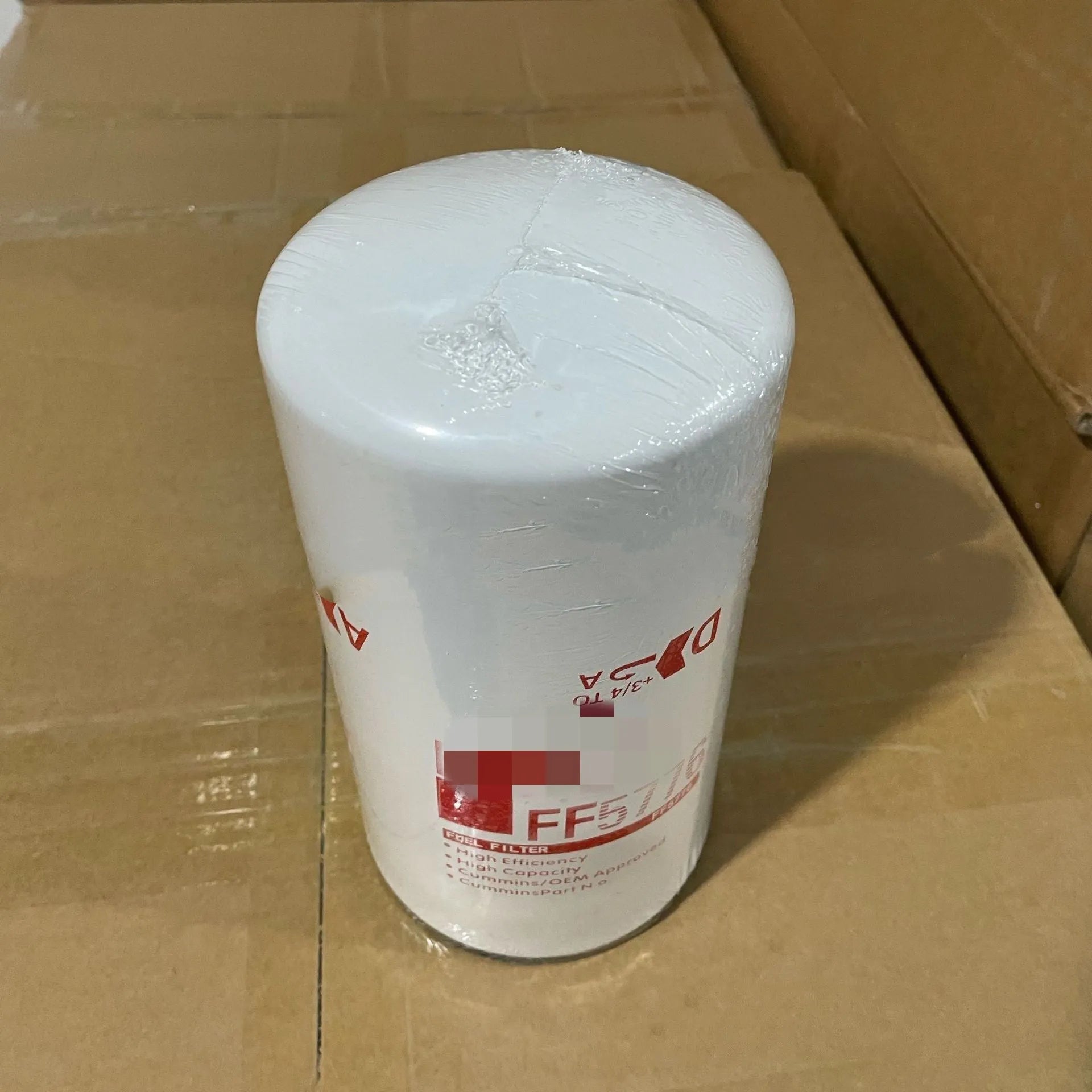 FF5776 white metal folding diesel filter element with 2mm ports for automotive oil systems.