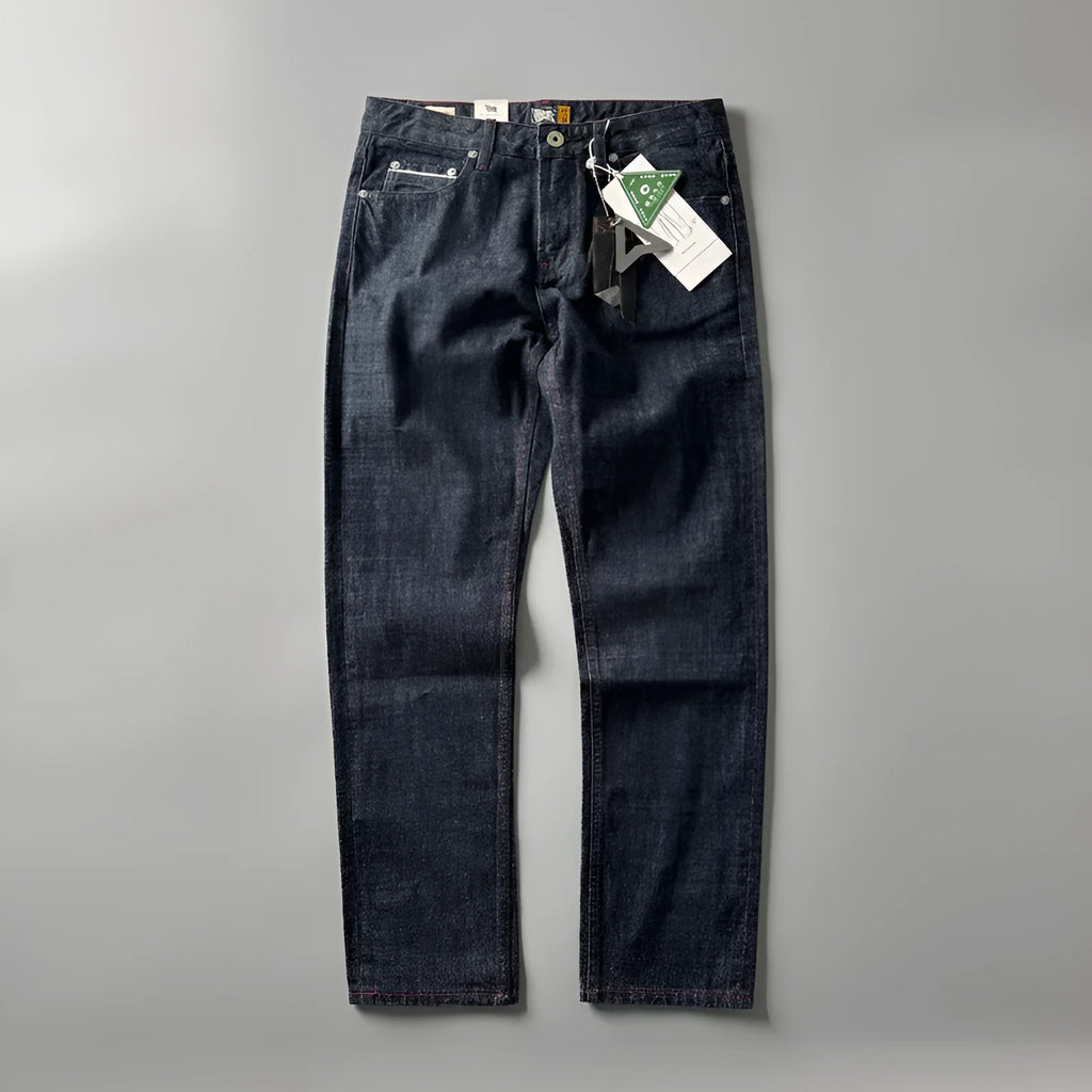 Men's primary colour straight leg jeans in American retro style laid flat, showing the mid waist and full-length leg.