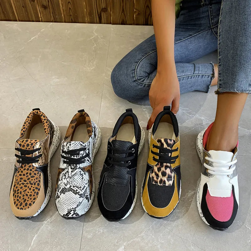 Women's casual flat sneakers with wedge heel in breathable fabric and suede, available in black, pink, and animal prints.