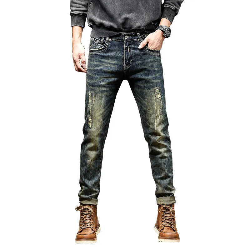 Man wearing retro blue stretch denim skinny jeans with a zip fly.