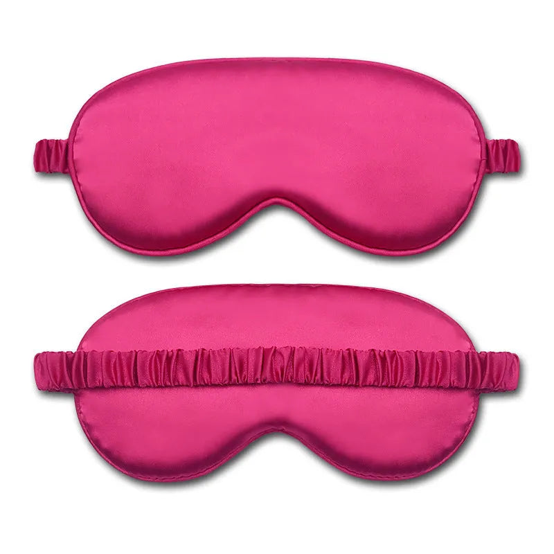 Double-sided silk-like sleep mask in rayon satin, shown in multiple colour options on a white background.