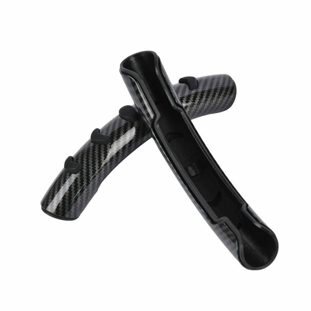 Carbon fibre black fibre anti-skid sleeve on a car steering wheel.