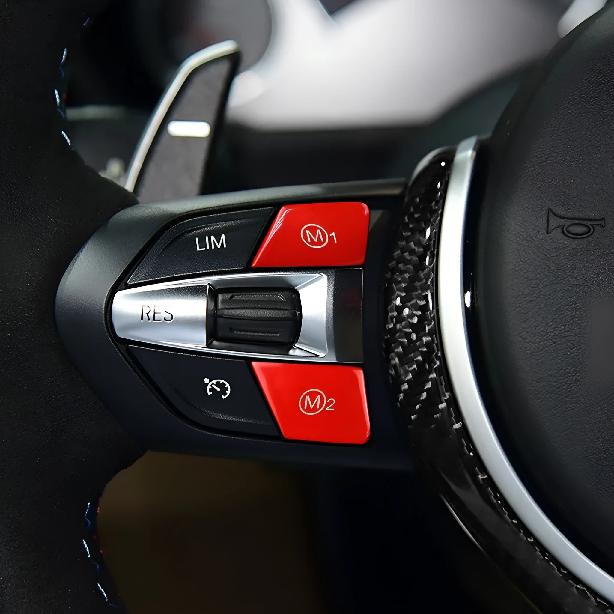 Pair of red and blue M1M2 steering wheel mode buttons for BMW F30 and F34 models with installation keys.