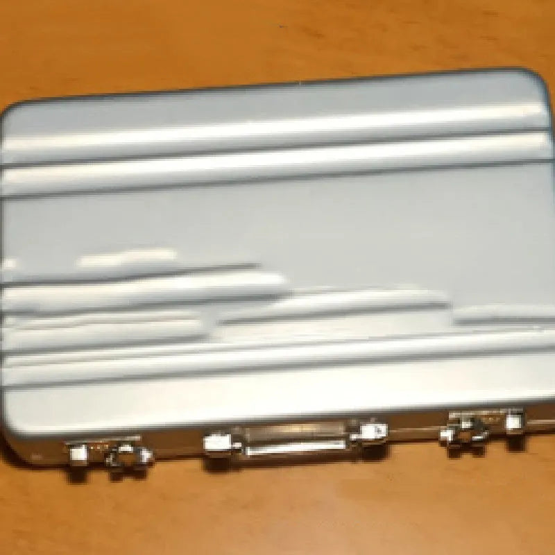 Slim aluminium alloy metal card holder in six colour options: red, blue, black, silver, pink, and gold.