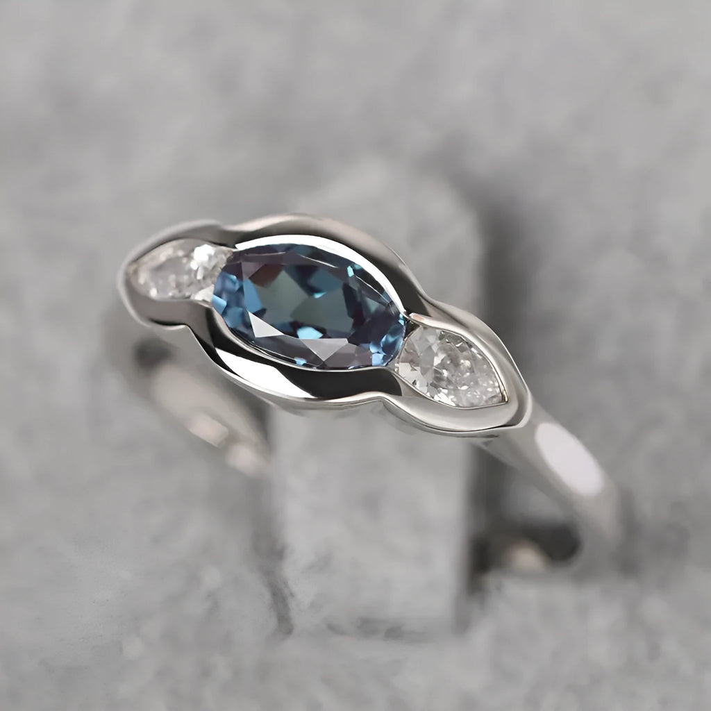 Geometric ellipse zircon ring in white gold colour showing contemporary design