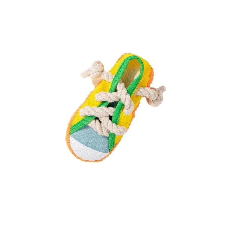 A bendable plastic dog slippers squeaker toy in yellow, black, or blue for chewing and play.