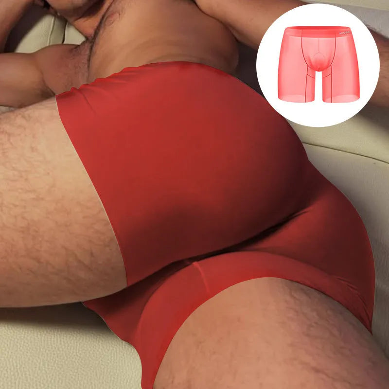 Seamless nylon men's sports shorts in orange, pink, or red with low waist and hip-lifting design.