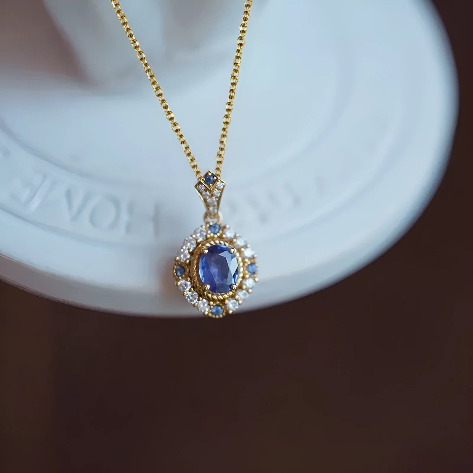 Women's royal style necklace with mixed gem pendant on adjustable yellow gold chain