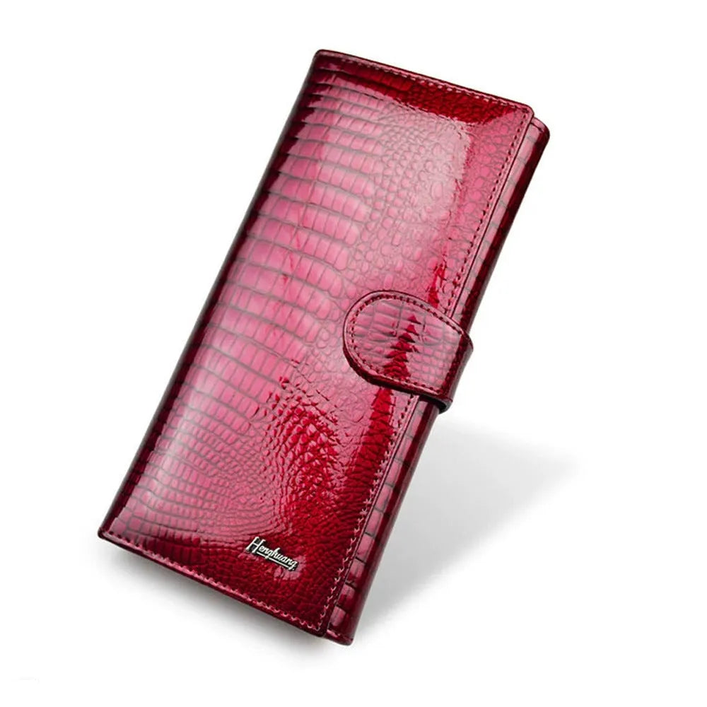 Crocodile pattern leather coin purse in wine red, black, or red colours.