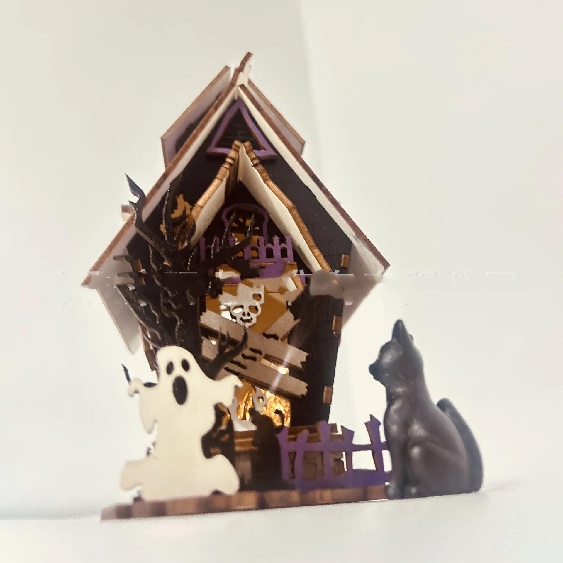 DIY wooden glowing haunted house Halloween decoration with candlestick holder, shown at 14x10.5x19cm size.
