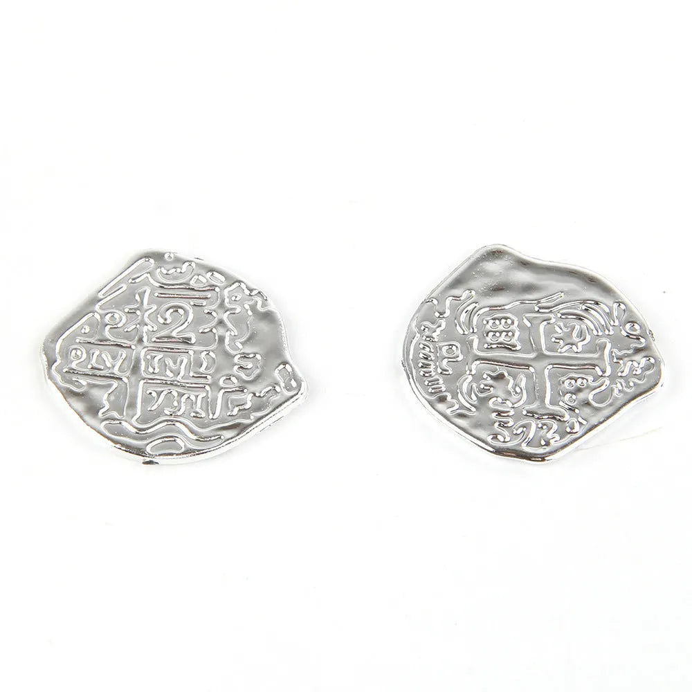 100 electroplated plastic Roman coin replicas in gold, silver, and bronze finishes for treasure chests and costumes.