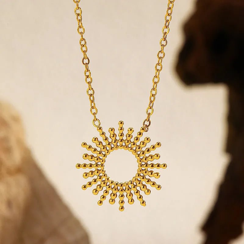 Gold geometric necklace and bracelet set with stainless steel construction and chain designs