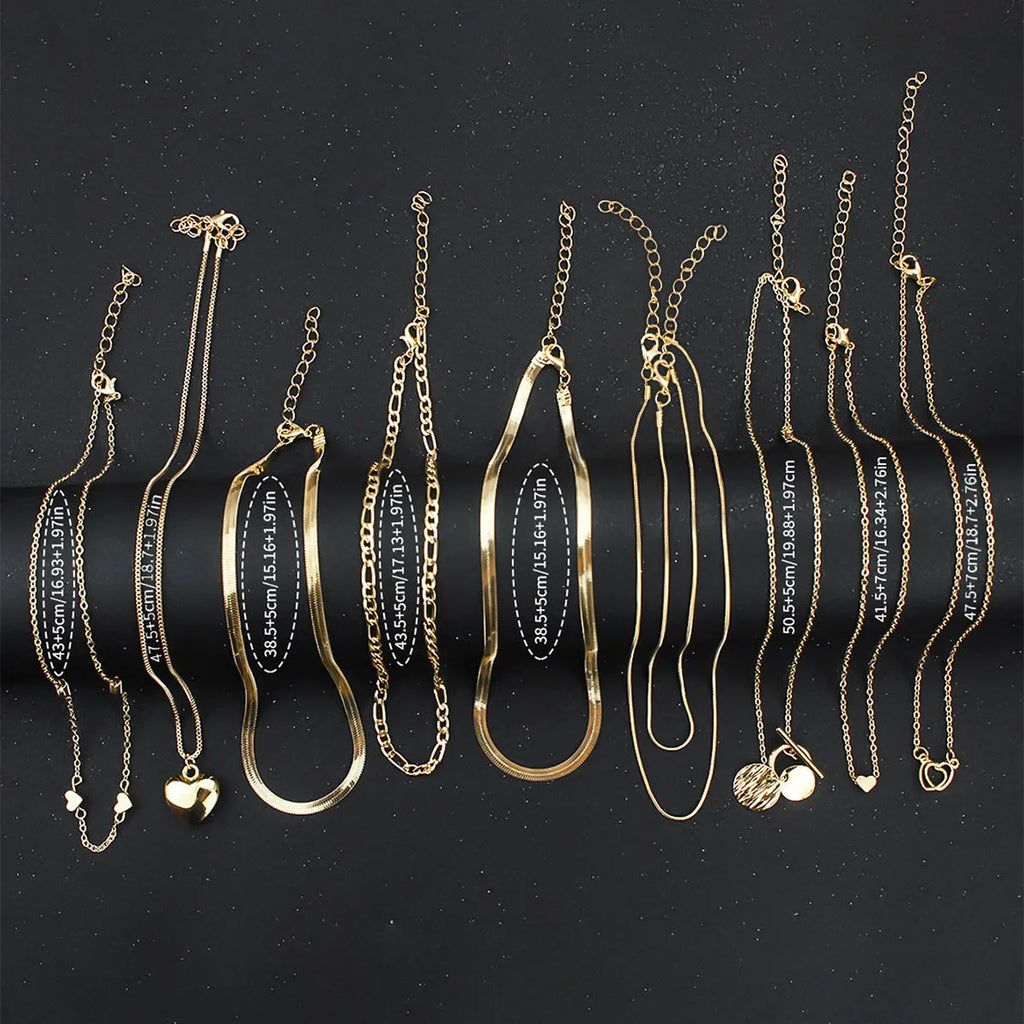 Women's gold electroplated ten-piece necklace set with snake bones chains and adjustable 21-50cm perimeter