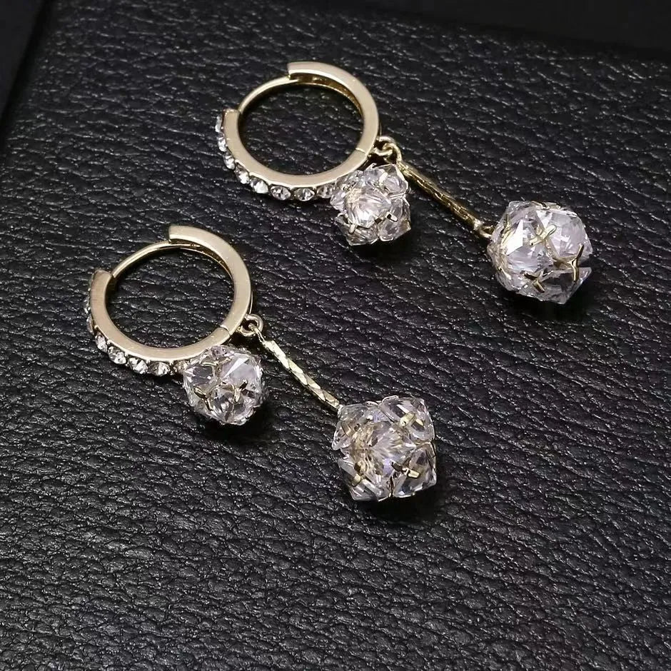 Women's silver tone drop earrings with tassel ball and rhinestone ball double pendant design