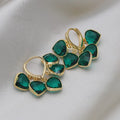 Green heart-shaped clip earrings with alloy inlaid gemstone details in Korean style