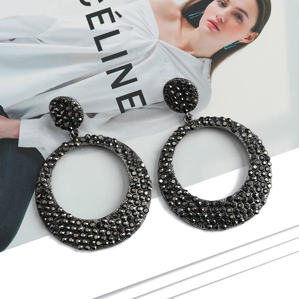 Women's metal alloy cartoon-style large pendant earrings with colourful diamond accents measuring 4-5cm