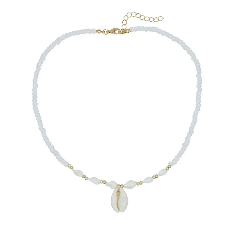 White conch shell necklace with mother pearl pendant on a regular electroplated chain.