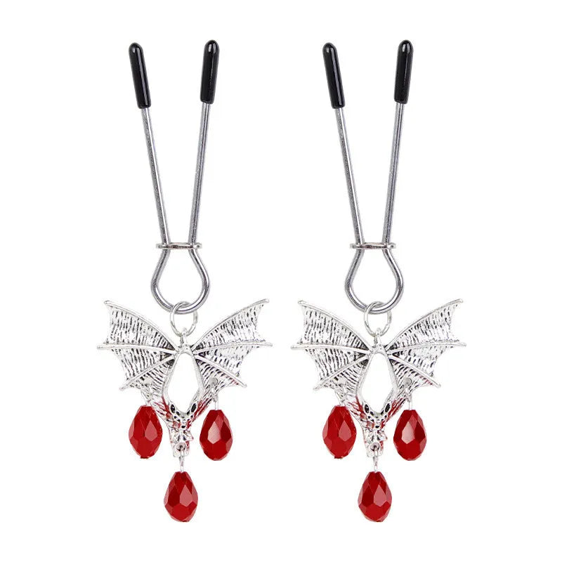 Silver bat nipple clamp with ruby design and adjustable pressure mechanism